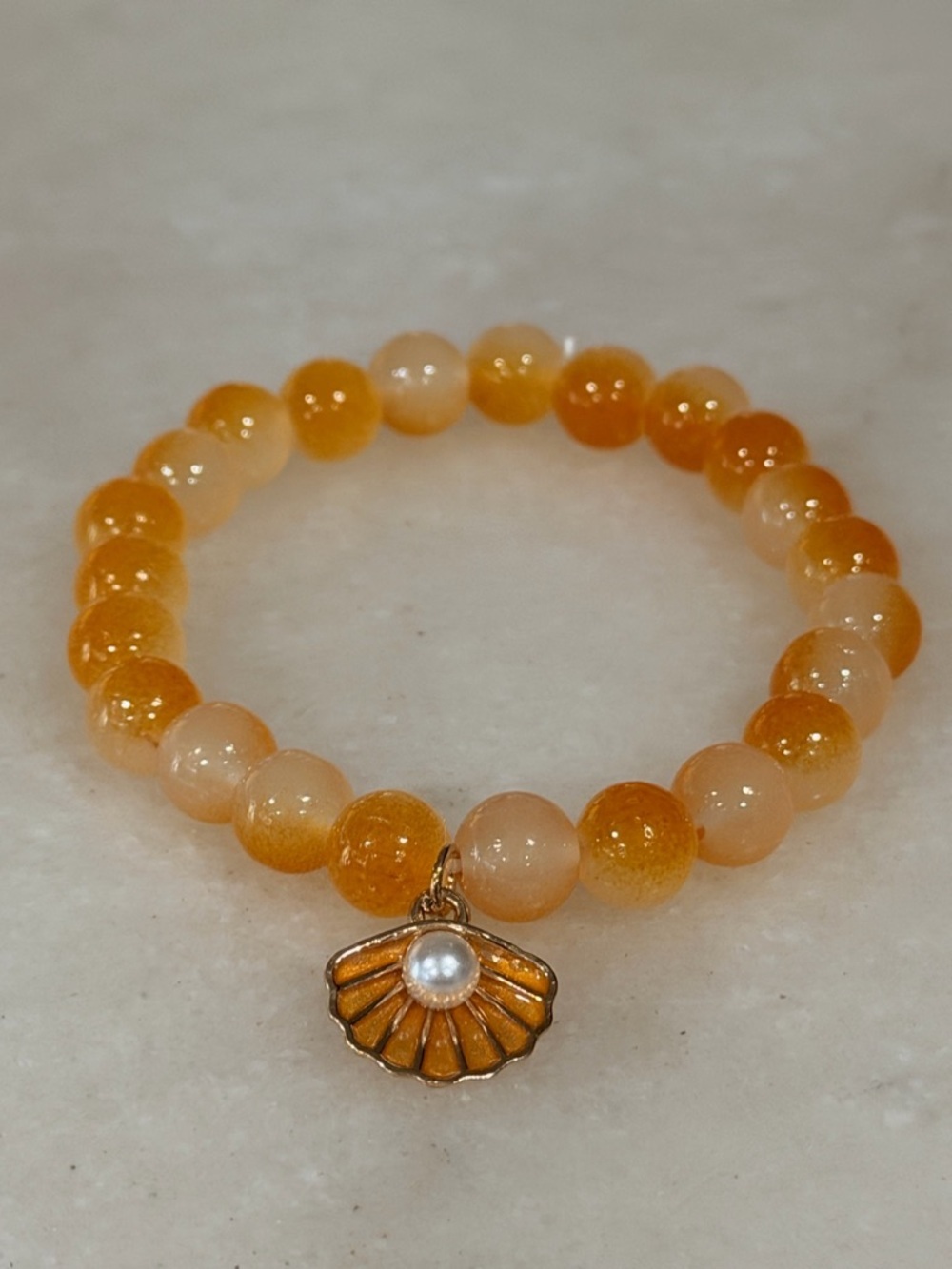 Gold-Tone Orange Beaded Shell Charm Bracelet